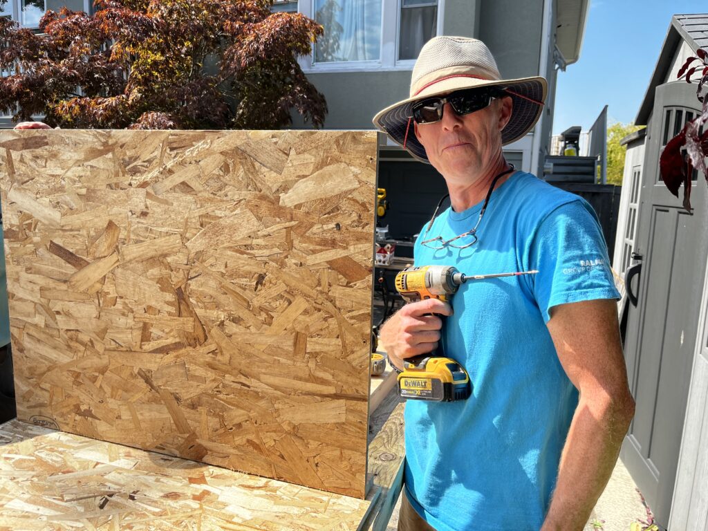 Esquimalt Men's Shed member participating in pantry building.