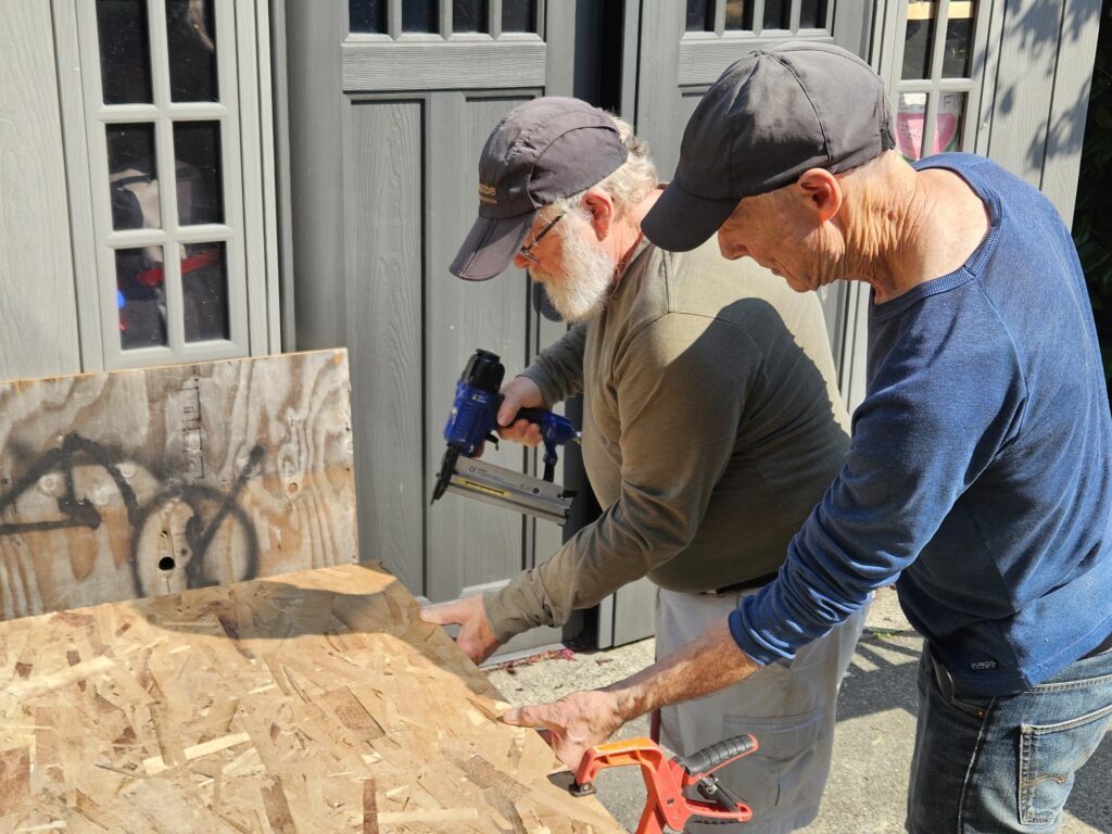 Nailing a pantry frame.