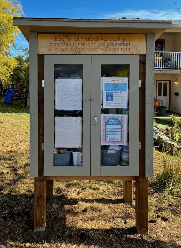 Mutual Aid pantry with sign.