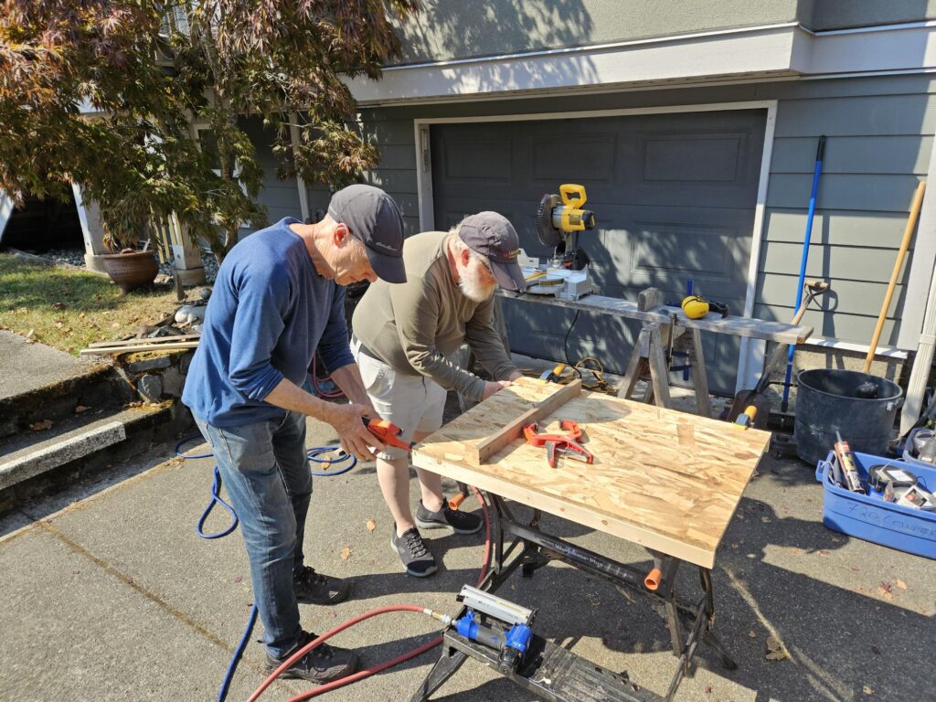 Getting ready to nail a pantry frame.